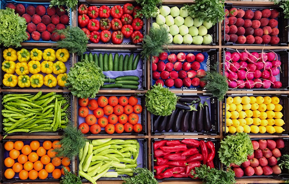 Fresh fruit and vegetables including capsicums, turnips, oranges, radishes